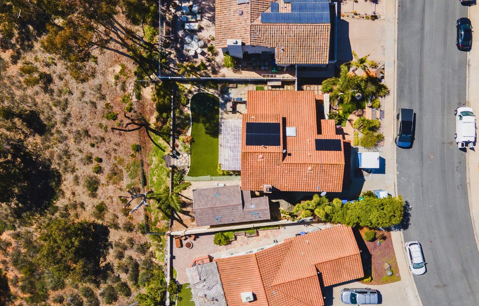 Aerial view of property site layout illustrating common FAQ considerations for 1192 sq ft 4 bedroom ADU plans.