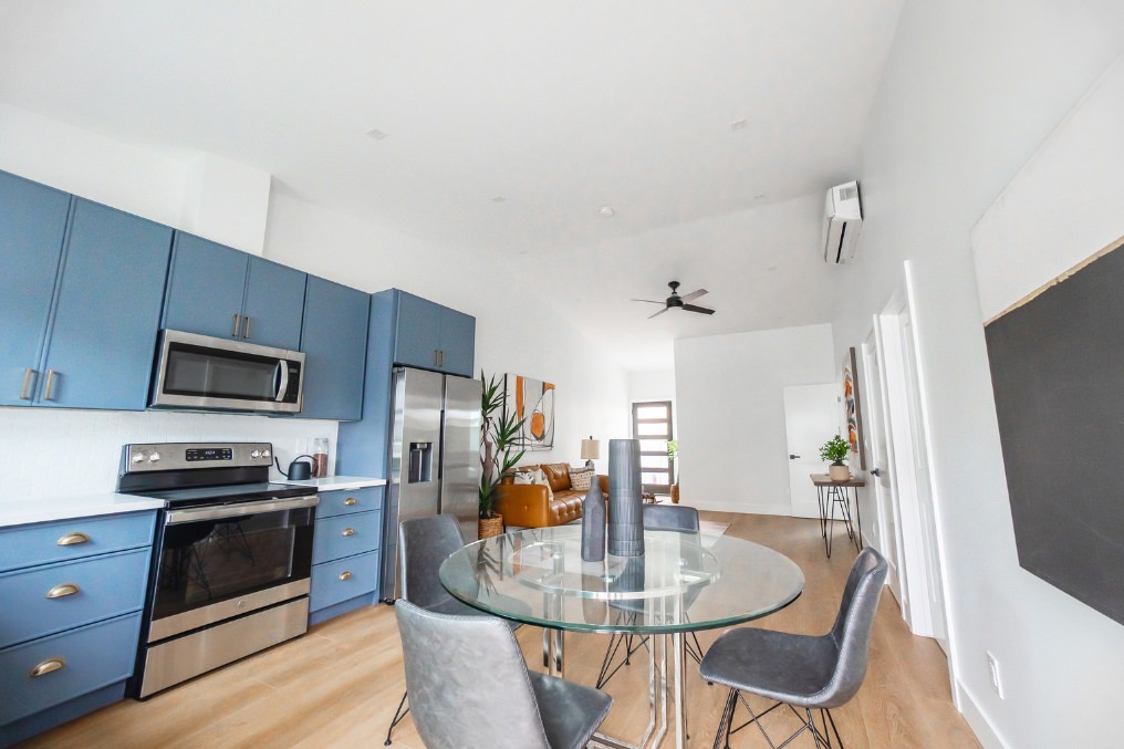 Modern dining space and open kitchen layout in contemporary Pacific Beach detached ADU.