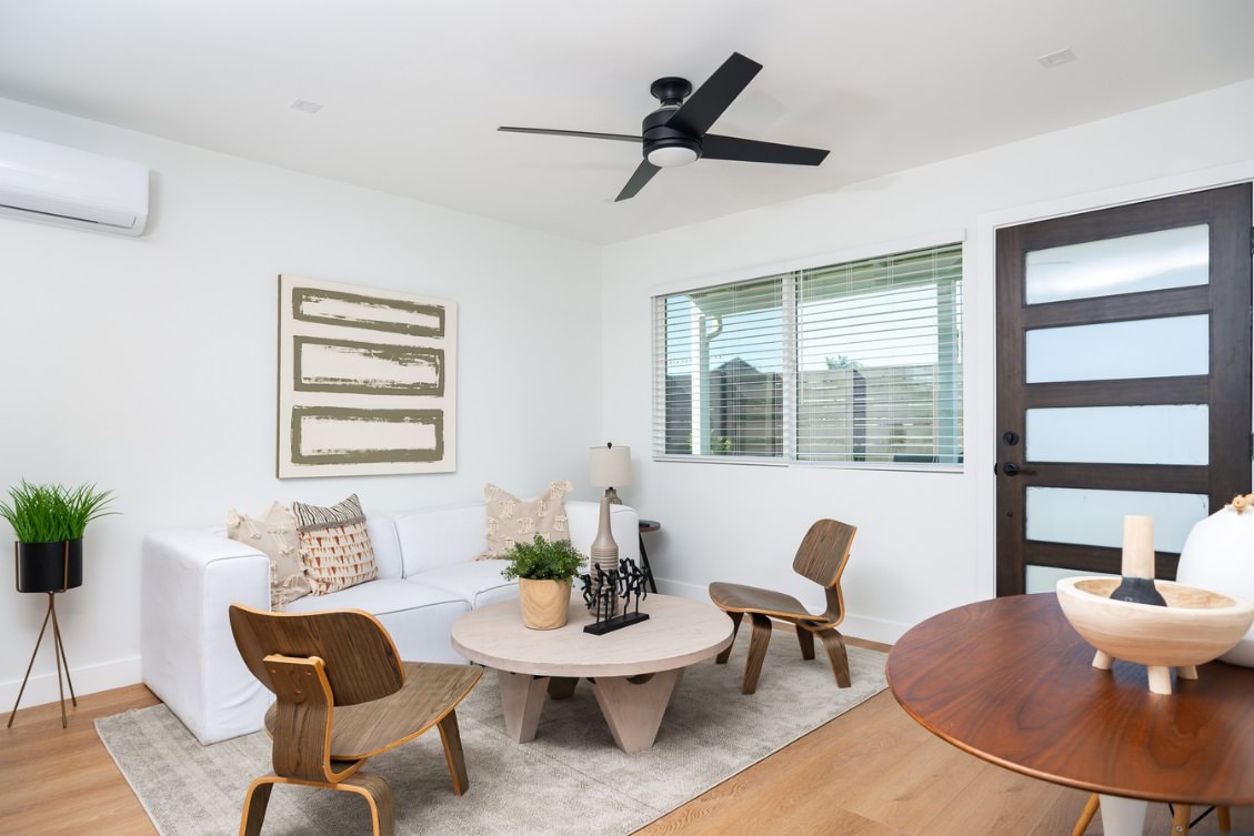 Scandinavian-inspired living room with modern furniture and natural lighting in Clairemont ADU