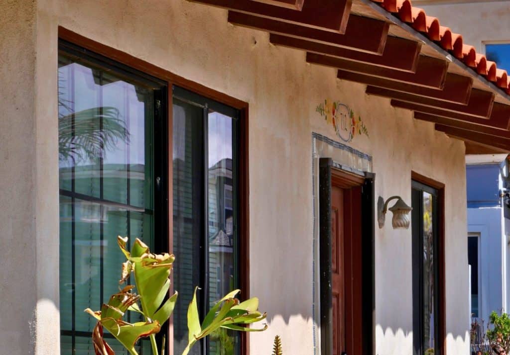 Spanish-style guest house with terracotta roof tiles.