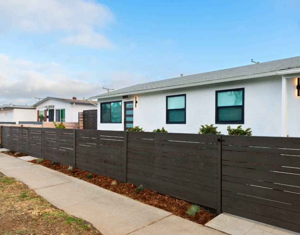 A bright, modern ADU with an open kitchen and living area, showcasing the potential for a comfortable rental space that generates extra income for homeowners.