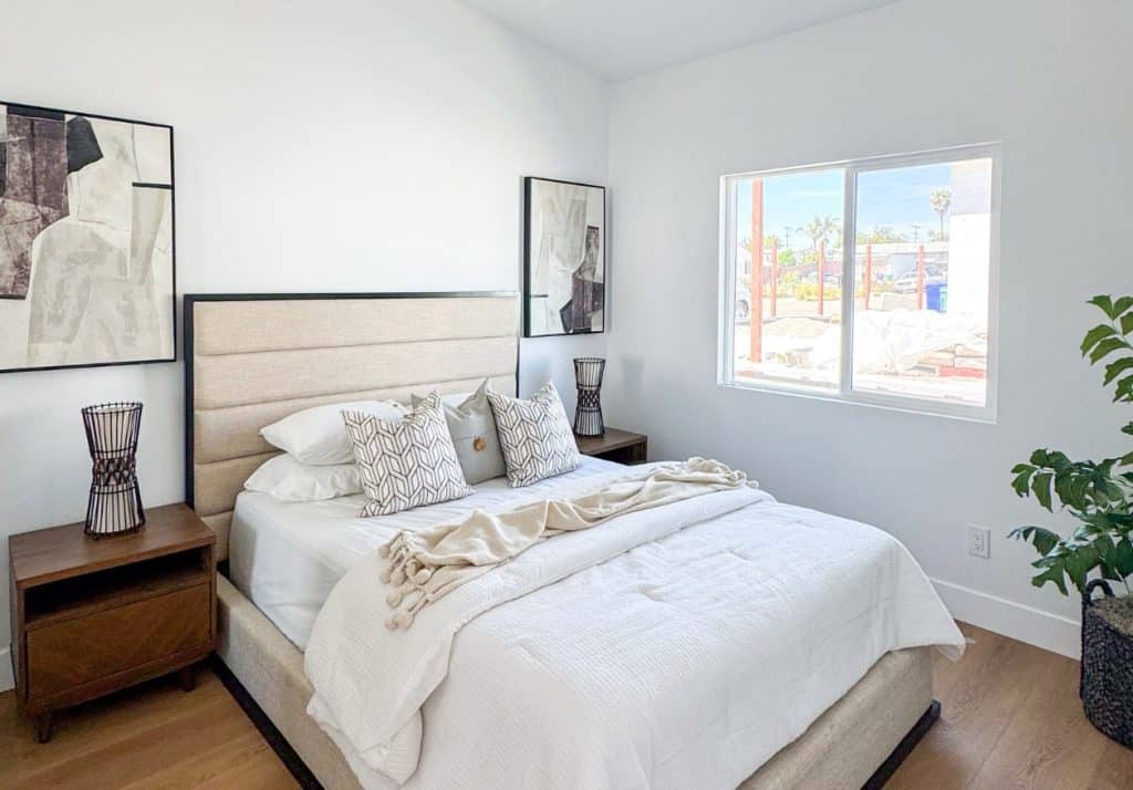 Bright and airy guest bedroom inside an ADU designed for long-term rental or family use.