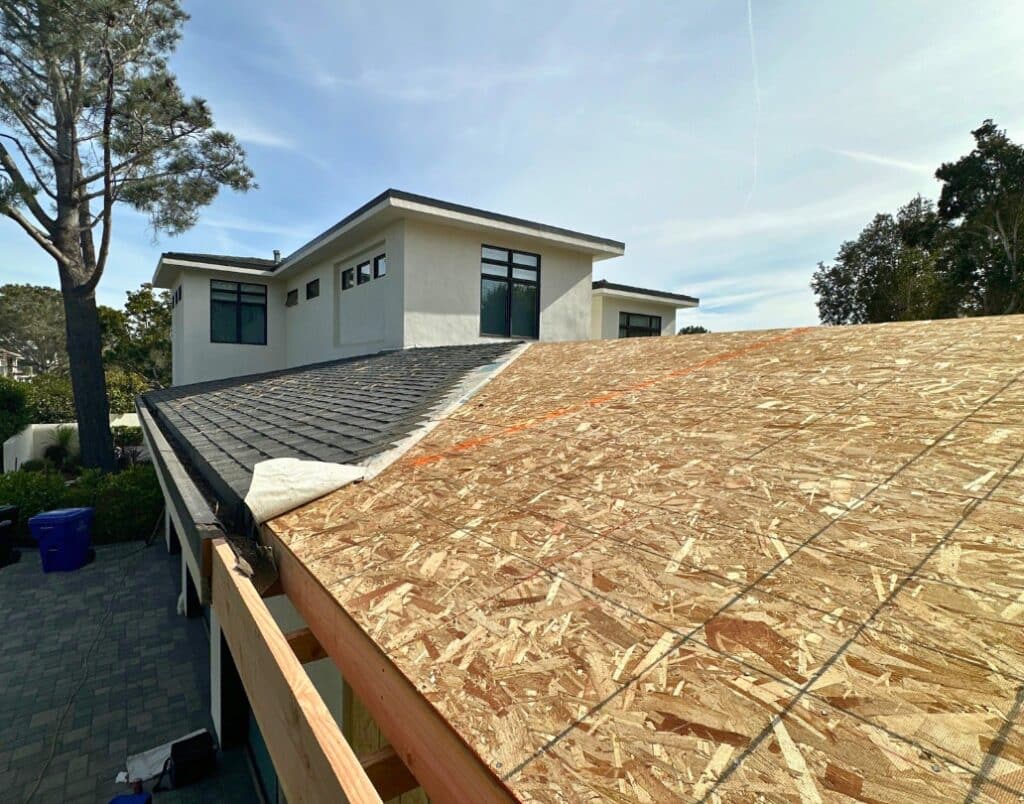 Construction of an attached ADU integrated into the primary residence with a shared wall.