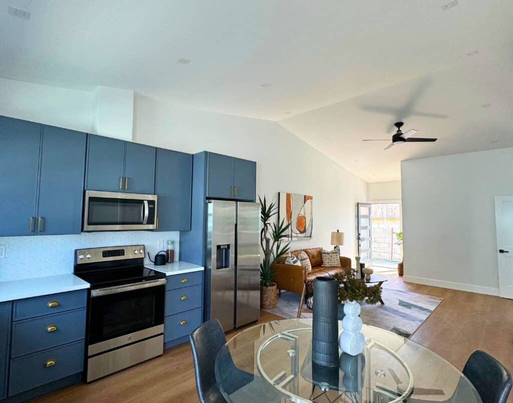 A spacious living room with vaulted ceilings, showcasing compliance with California’s height regulations while enhancing the sense of openness.