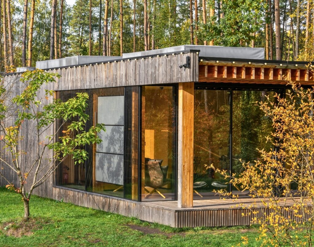 A prefab ADU featuring a wood and metal exterior, showcasing its ability to blend modern design with quick installation.