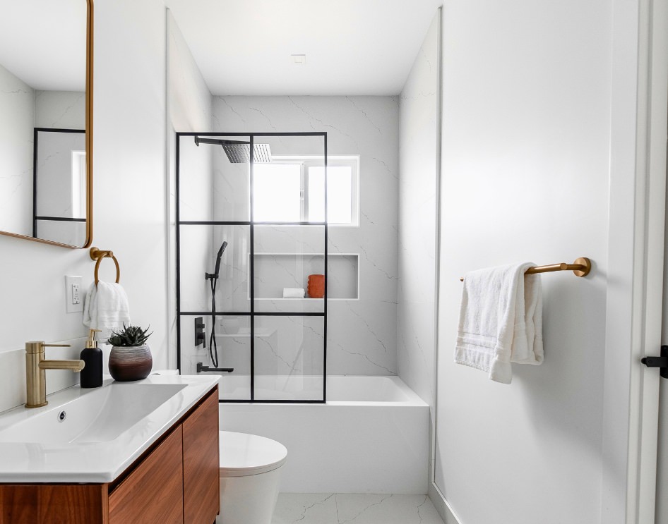 Modern bathroom with sleek design in an ADU, including a shower and clean finishes.