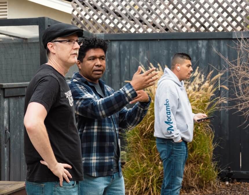 Homeowners discussing project plans outside - used in "How Better Place Design & Build Can Assist."