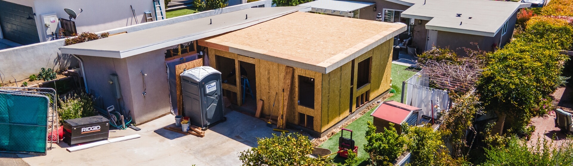 Understanding SB9 and Its Impact on ADUs – construction plans and framing tools illustrating SB9 considerations.