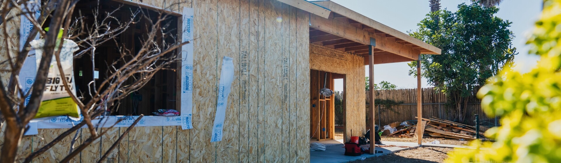 Fully constructed detached granny flat nestled in a residential backyard.