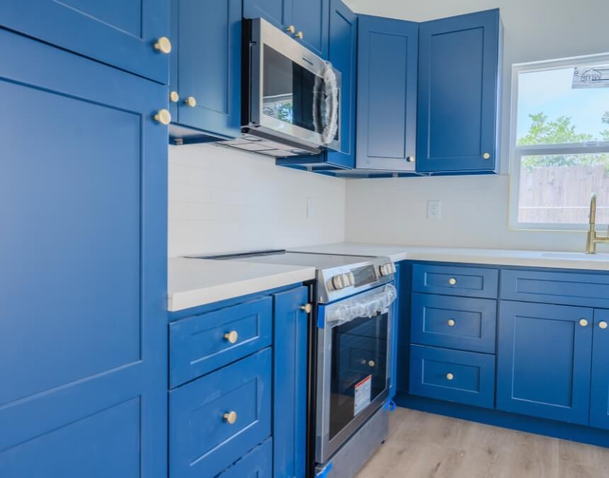 Newly installed ADU kitchen appliances connected to dedicated electrical circuits for safety and efficiency.