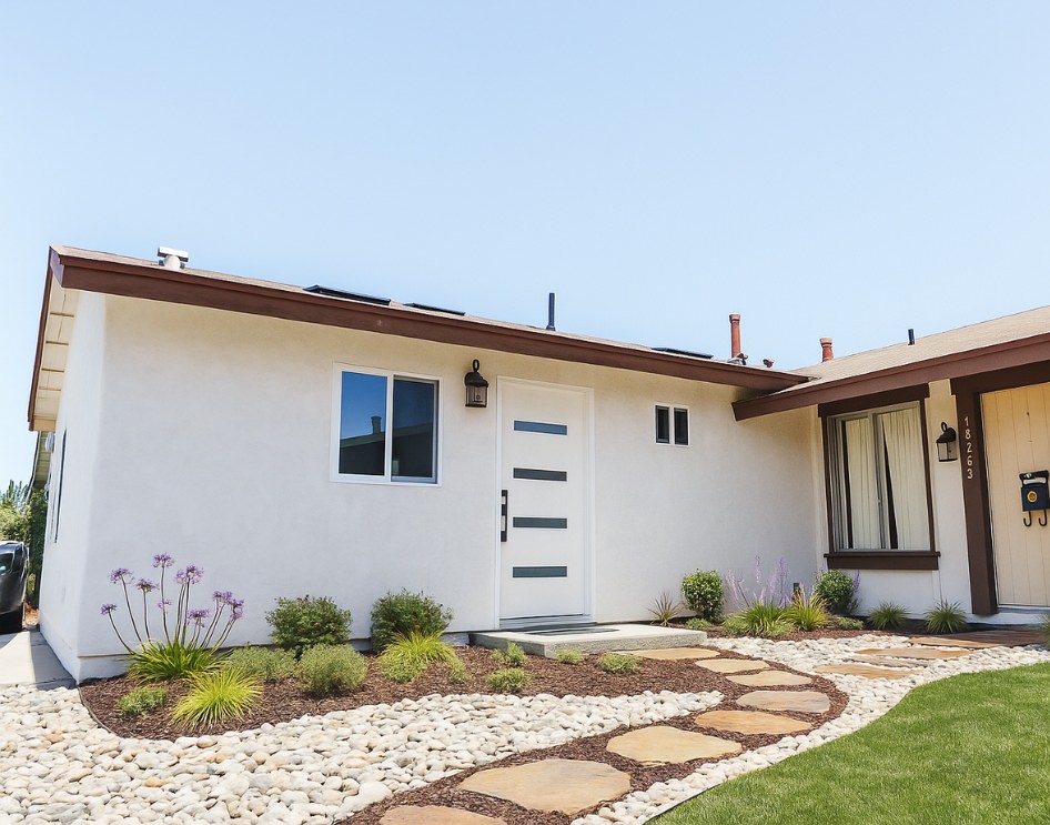 Garage conversion ADU seamlessly integrated into an existing home structure.