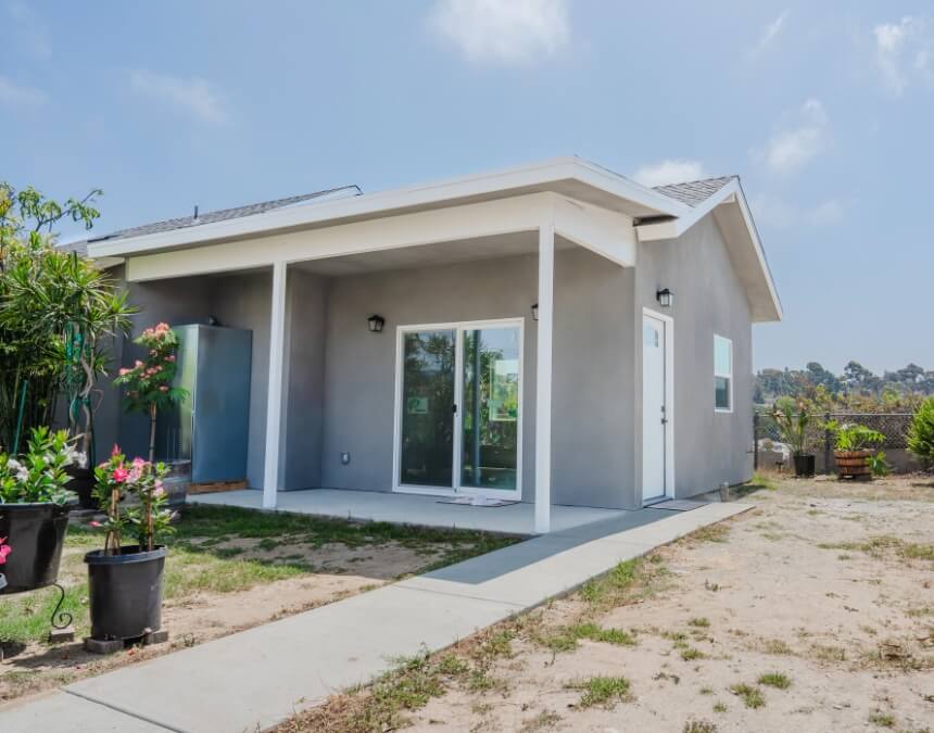 Understanding Zoning Ordinances California San Diego – detached backyard ADU with patio and sliding glass doors.