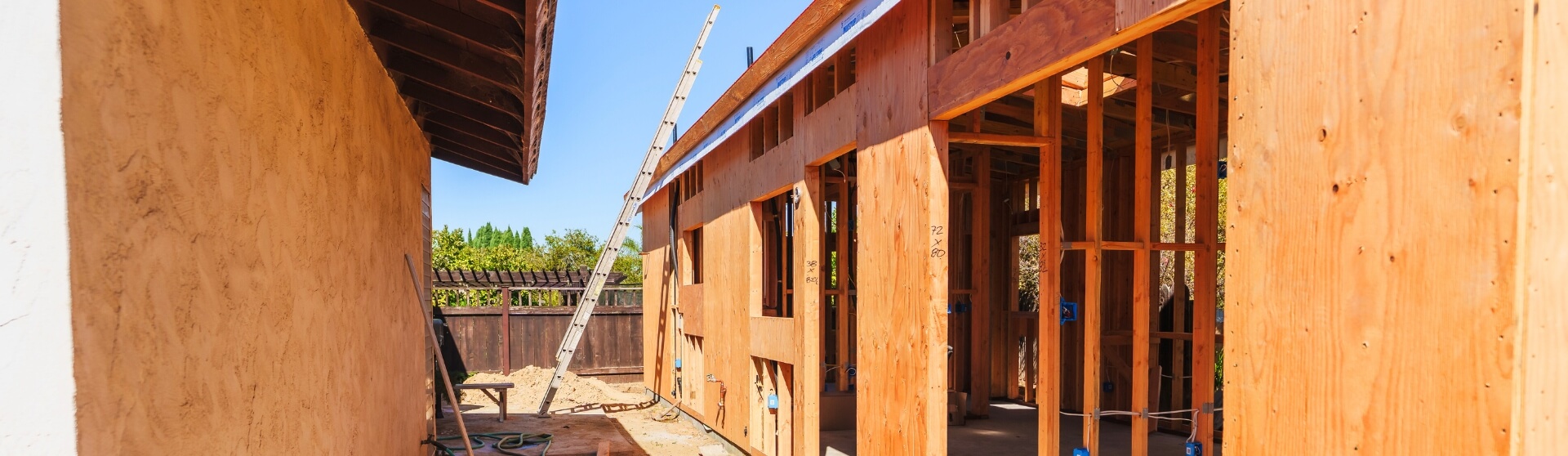 Construction Loans vs. Personal Loans for ADUs: What Do California Homeowners Need to Know — framing stage of an ADU under construction.