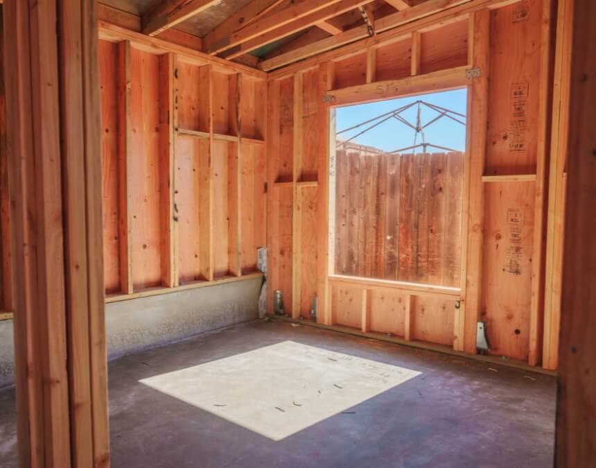 Construction Loans vs. Personal Loans: What’s the Difference — interior framing of an ADU showing early build phase.