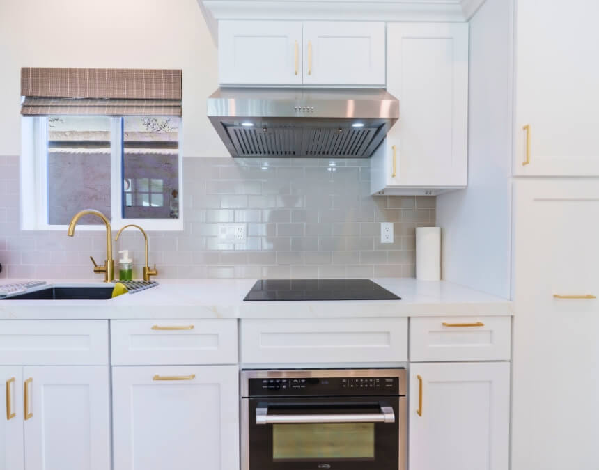 “Evaluating a Builder’s ADU Experience” image of a finished ADU kitchen with modern cabinetry and appliances.