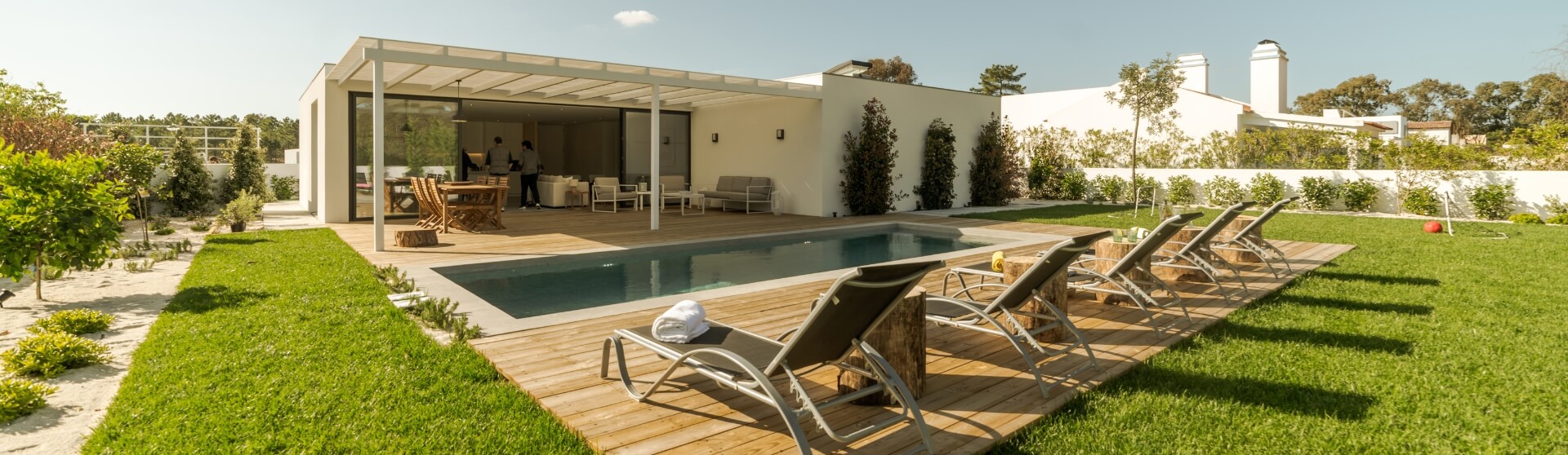 How Do You Integrate Outdoor Living Into ADU Design by extending usable space through patios decks and seamless indoor outdoor connections