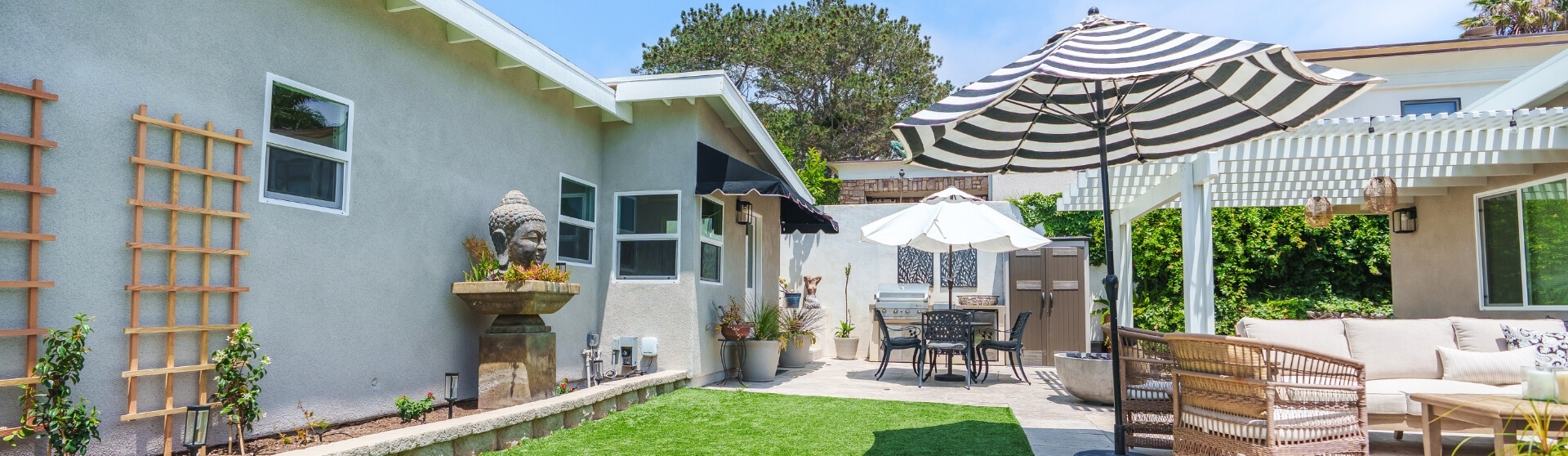 What are the universal design principles for ADUs showing a California neighborhood with multiple accessory dwelling units integrated into existing homes