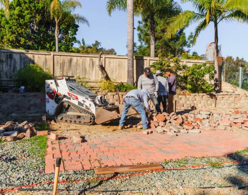 Engaging the Right Team – contractors working on site with equipment during ADU site preparation and groundwork