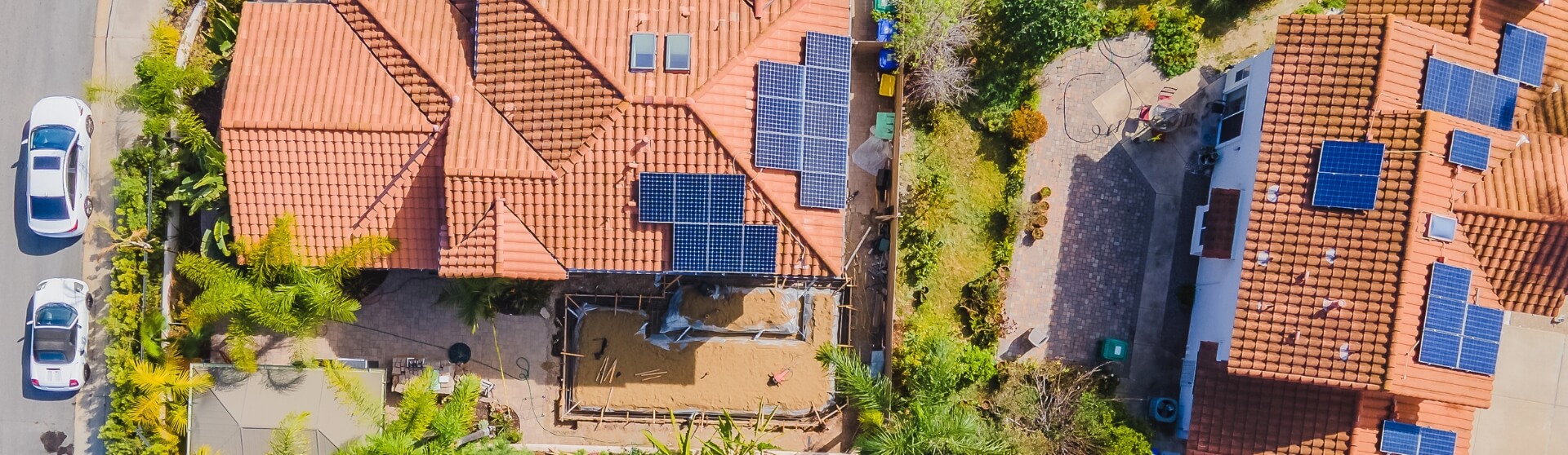 What are the ADU electrical requirements in California in 2026 with aerial view of solar-ready residential ADU construction