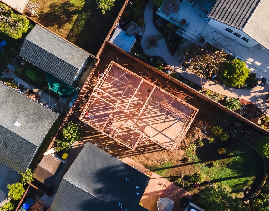 Are there ADU grants or assistance programs available - aerial view of a completed backyard ADU in a California residential neighborhood